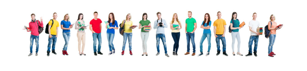 Group of smiling teenagers staying together and looking at camera isolated on white