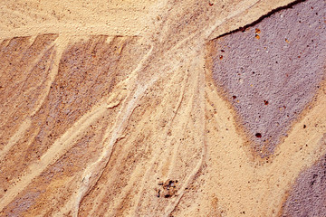 Abstract golden sand texture on the beach, top view