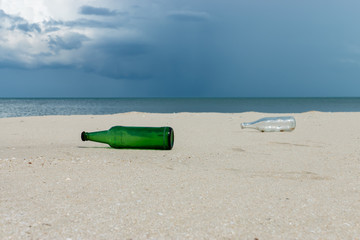 Glass bottles on the beach