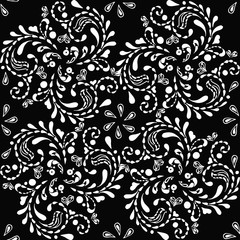 Seamless white floral pattern on a black background. Decorative ornament backdrop for fabric, textile, wrapping paper, card, invitation, wallpaper, web design