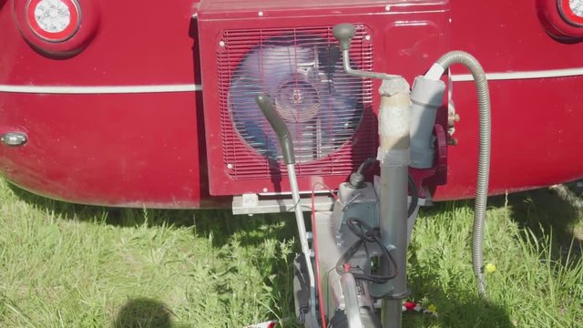 View of working air conditioner compressor of auto trailer