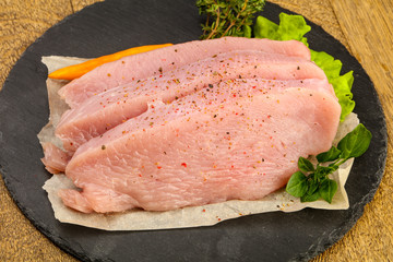 Raw turkey steak