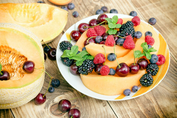 Healthy food, vegetarian eating - fresh organic fruit  in plate