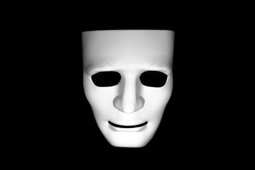 White mask isolated on black background