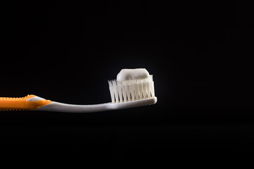 toothbrush black background