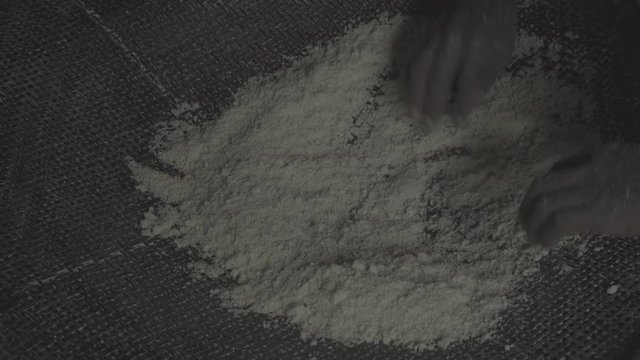 Sifting manioc flour
