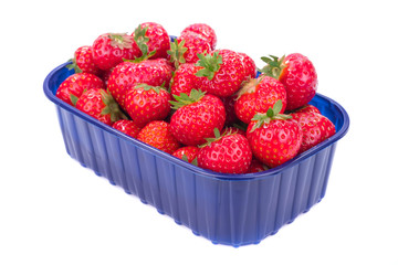 Strawberries in blue plastic box