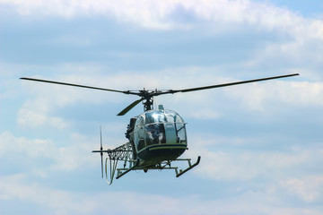 helicopter fly at the sky