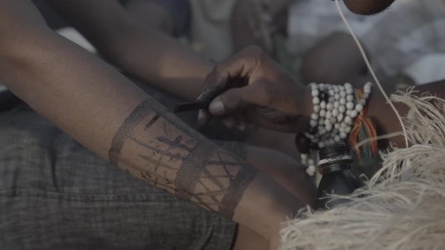 Indigenous painting on the arm