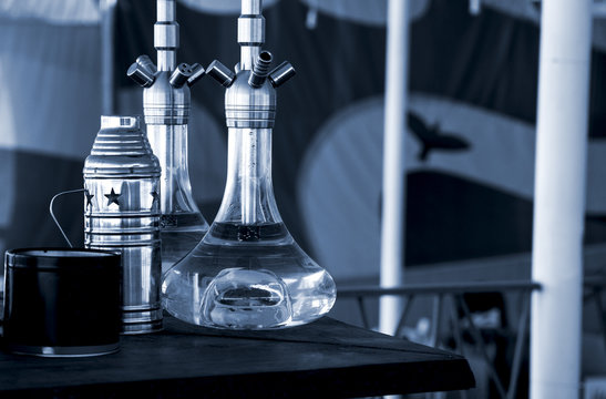Hookahs and accessories in hookah cafe near the sea