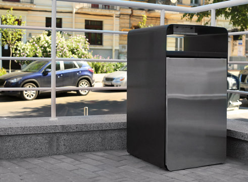 Modern garbage bin outdoors. Concept of environment preservation