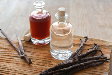 Ingredients for homemade vanilla extract on wooden board