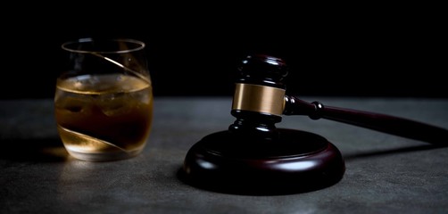 Judge's Gavel and glass of whysky