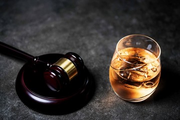 Judge's Gavel and glass of whysky