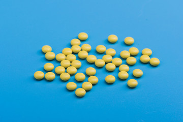 Yellow medical pills