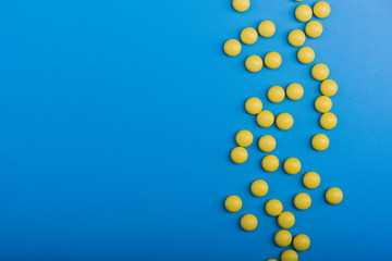 Yellow medical pills