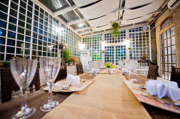 restaurant glass of water on table / dish and spoon