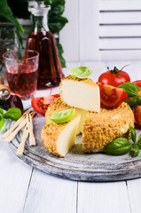 Round smoked cheese