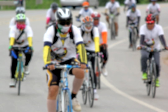 blurry picture of cyclists in bicycle race