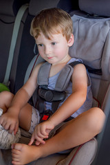 baby boy in car seat.