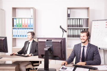 Employe from Customer service support working in office. Professional online and telephone assistant support