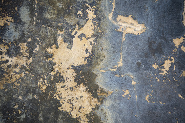 Peeling paint. Concrete, weathered, worn wall damaged paint. Grungy Concrete Surface. Great background or texture.