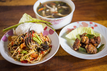 papaya salad. Mushroom soup. Fry pork ribs