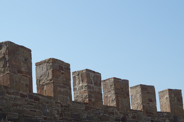 Obraz premium Old wall with battlement in Sudak fortress, Crimea