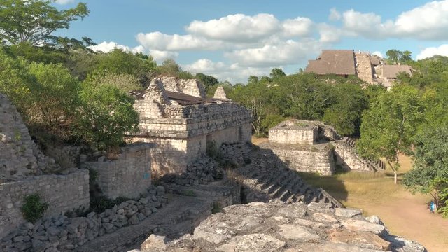 CLOSE UP: Impressive Maya buildings at the Ek Balam archeological site. Majestic ruins of the chapel and the temple in the historic walled city Tulum, Mexico. Remains of ancient Mayan civilization