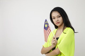 holding malaysia flag