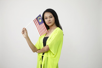 holding malaysia flag