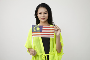 holding malaysia flag