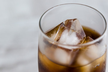 cola with ice cubes