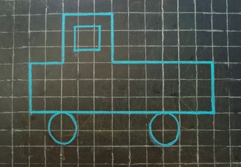 The truck drawn by chalk on a blackboard