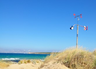 Santa Maria beach with windbreak anemometer on Paros island