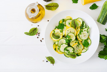 Salad of pickled zucchini with garlic. Flat lay. Top view