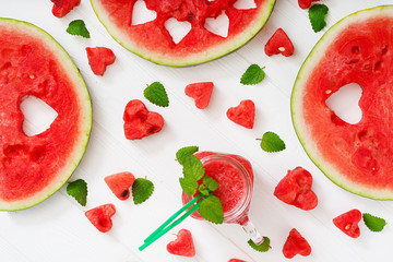 Fresh watermelon smoothies with mint on white wooden background. Flat lay. Top view