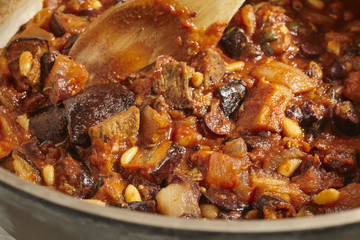 Caponata, a stew of eggplant, tomato, raisins and pine nuts, from Sicily, Italy
