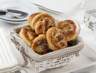 Homemade pretzels with sesame and poppy seeds.