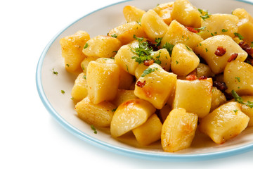 Potato noodles - dumplings on white background 