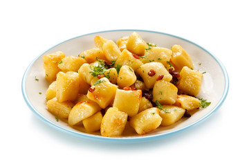 Potato noodles - dumplings on white background 