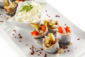 Marinated herring fillets on white background 