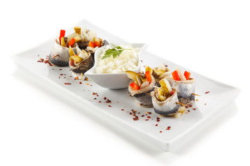 Marinated herring fillets on white background 