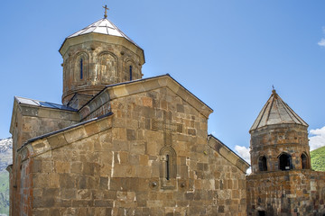 Fototapeta na wymiar Gergeti Trinity Church (Tsminda Sameba), Holy Trinity Church near the village of Gergeti in Georgia, under Mount Kazbegi