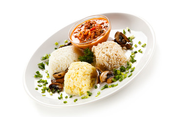 Rice dish with sauce on white background 