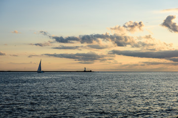 Naklejka na ściany i meble sea ships on the horizon in sunset