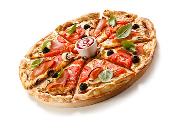 Pizza with ham, tomatoes, mushrooms and olives 