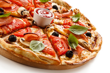 Pizza with ham, tomatoes, mushrooms and olives 