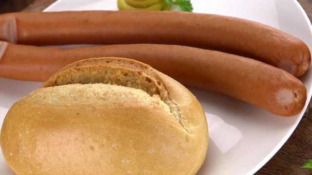 Wiener Sausage on a rotating wooden plate (not loopable; 4K)