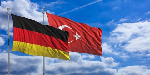 Turkey and  Germany waving flags on blue sky. 3d illustration